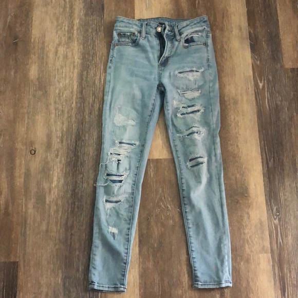 I am selling a pair of Ripped blue jeans. - Picture 1 of 3
